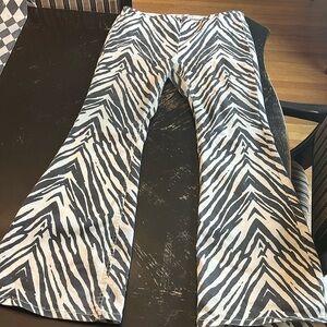 Super fly FREE PEOPLE zebra striped mid rise bell bottoms size 32!
